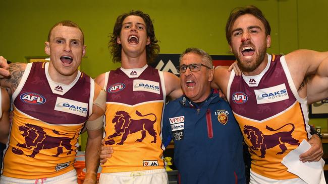 Robinson (left) has formed a special bond with Lions coach Chris Fagan, who he says is like a “dad” to him. Picture: Quinn Rooney/Getty Images