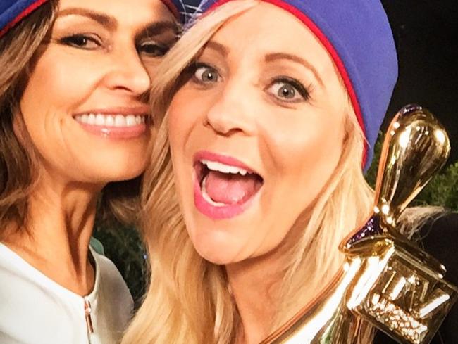 Carrie celebrates her Gold Logie win with Lisa.