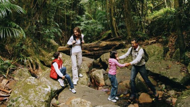 Family exploring the base of Mount Warning.