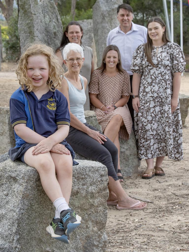 Mack’s sister Scout, seven, is a Year 1 student at the school. Behind her from left are staff members Raewyn Rice, Stacey Turner, Louise Simpson, Andrew Blake and Britanii Norris. Picture: Zoe Phillips