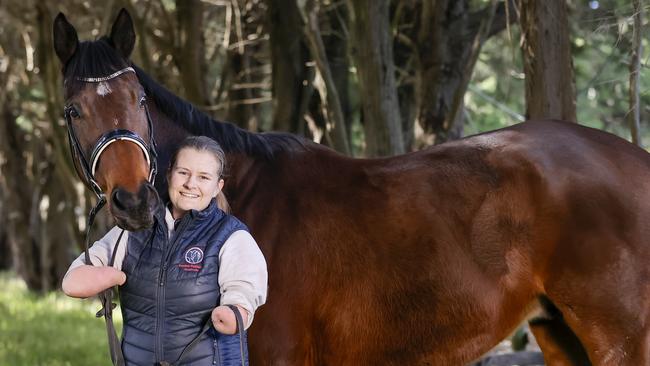 Aspiring Paralympian Abby Vidler with ex-racehorse Retaliation, now named Tally, at the Balmoral Equestrian Centre in Narre Warren North. Picture: Alex Coppel