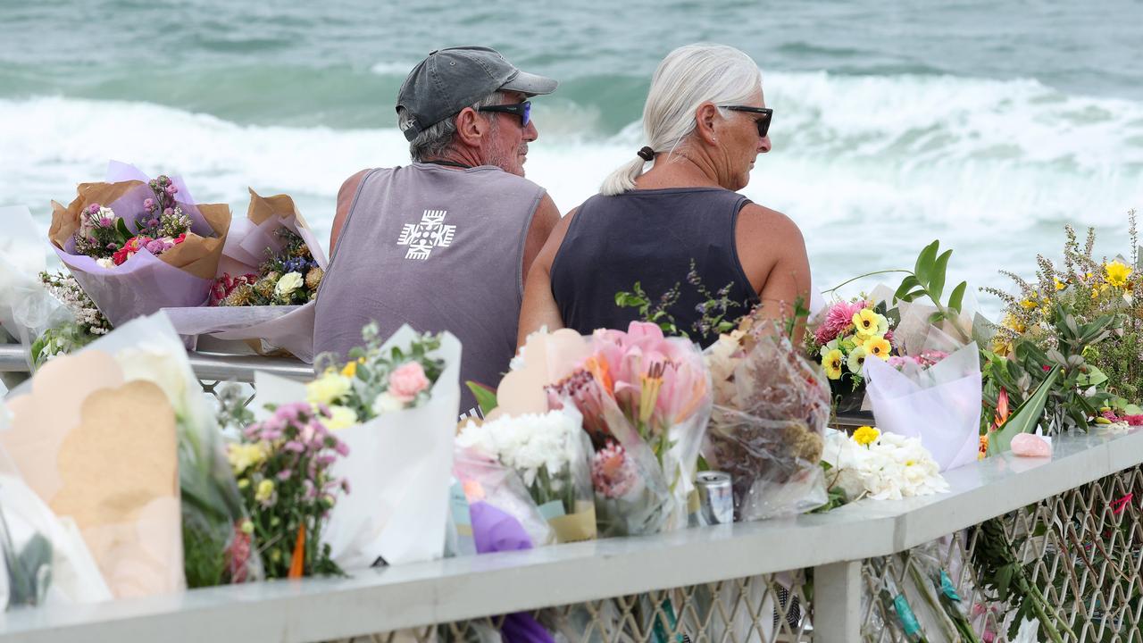 Flowers left for Charlize Zmuda at Woorim beach, Bribe Island. Picture: Liam Kidston