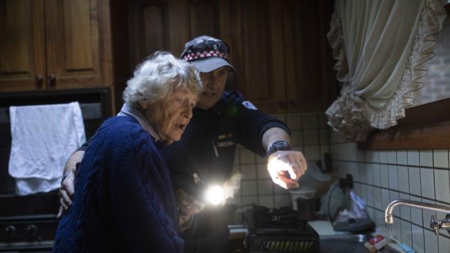 Saturday 19th June 2021.  Day 11 for Shayne O'Dwyer CFA volunteer still doing welfare checks on residents of Kalorama in the Dandenong Ranges, one of the worst hit in the area.Shayne O'Dwyer checks on Merlyn on Erith Lane, living alone at 93, Merlyn Edgar was eating cold soup out of a can as she couldn't get a camping cooker to work.  Shayne brings her an easy to use camping cooker and sets it up for her.  Minutes later the Red Cross finally arrive to take over.Photograph by Arsineh Houspian