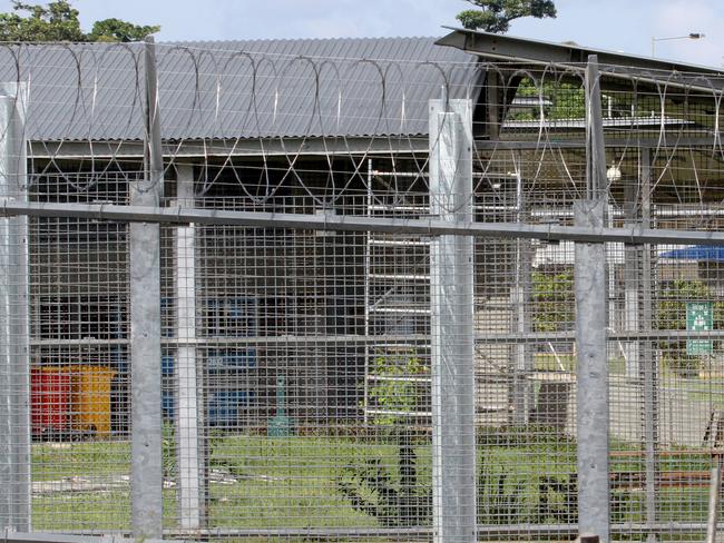 NO BYLINE...Evidence of increasing security with newly installed razor wire on the perimeter fence, newly erected pylons for new internal fence. Yellow tape indicates new work at the Christmas Island Immigration Detention Centre. Supplied