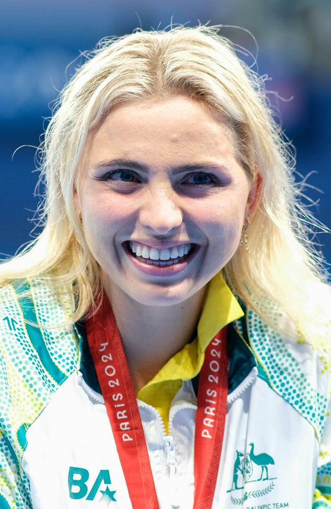 Australia's golden girl of the pool, Alexa Leary, wins the Paris Paralympic 100m S9 100m freestyle in a world record time at the La Defense Arena watched by her family and friends. Photo: Jacquelin Magnay