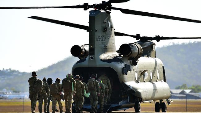 Two CH-47 Chinooks left Townsville RAAF Base to relieve previous crews down south helping with the Australian Bushfires. Picture: Alix Sweeney