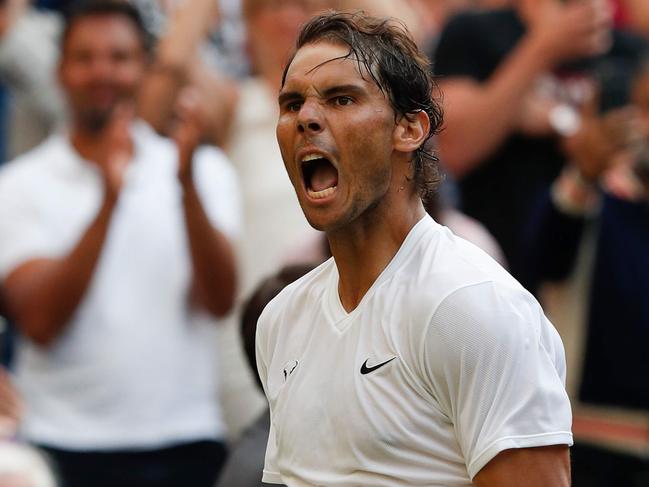 Spain's Rafael Nadal celebrates beating Australia's Nick Kyrgios during their men's singles second round match on the fourth day of the 2019 Wimbledon Championships at The All England Lawn Tennis Club in Wimbledon, southwest London, on July 4, 2019. (Photo by Adrian DENNIS / AFP) / RESTRICTED TO EDITORIAL USE