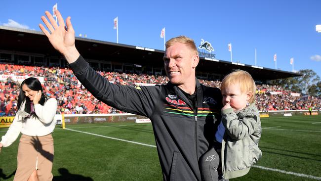 Retiring Panthers captain Peter Wallace gestures to supporters before the game. (AAP Image/Dan Himbrechts)