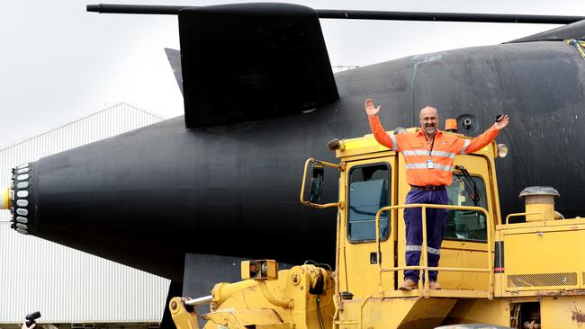 ASC rolls out HMAS Farncomb from the maintenance shed. Steve Sorrenti from Lucas Total Contract Solutions happy after he successfully moved the sub out the shed. Picture: Tricia Watkinson.