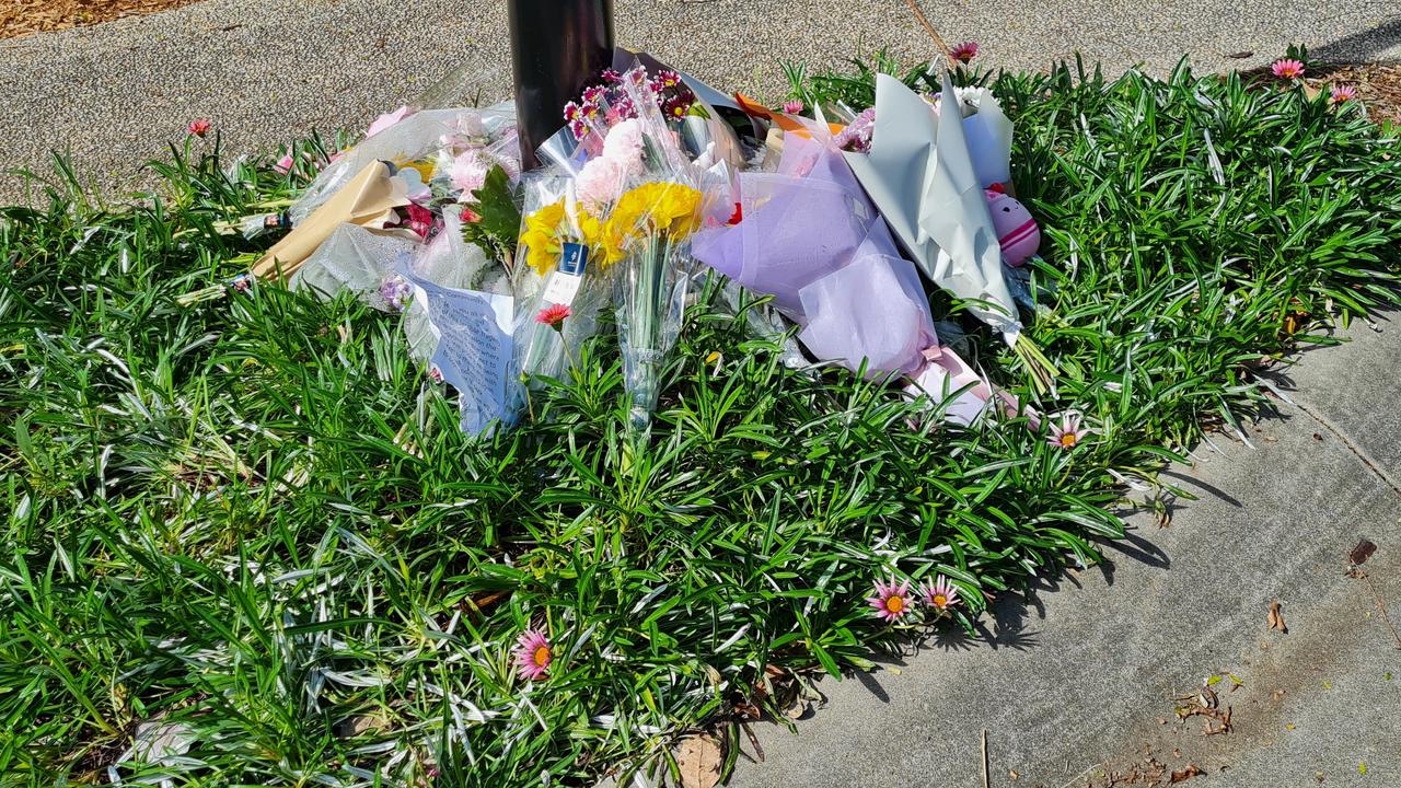 Piles of flowers lined the street. Picture: NewsWire / Blake Antrobus