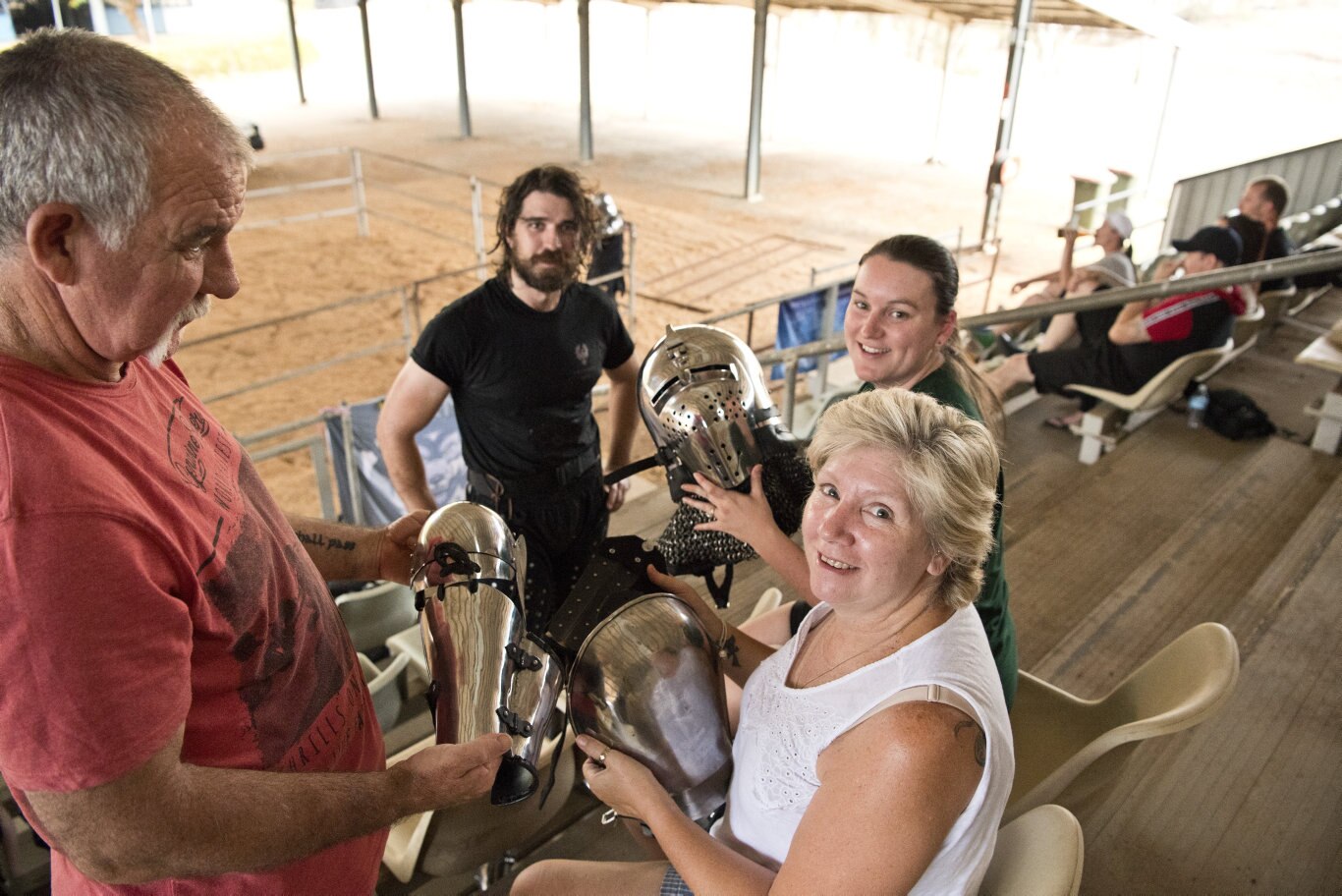 Looking over the armour used are (from left) Michael Castley, Gold Coast club member Damian Seery, Karen Castley and Kirri-Lee Simpson (back).