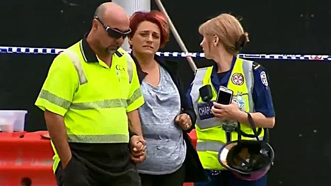 His mum Patrizia Cassaniti, pictured with her husband, broke down at the scene where she often served her son, after hearing the news. Picture: 9 News