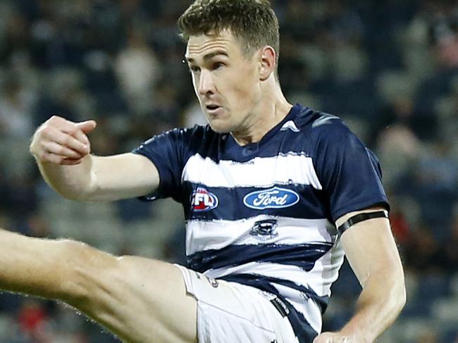 GEELONG, AUSTRALIA - MARCH 06: Jeremy Cameron of the Cats   kicks for goal during the AFL Community Series match between the Geelong Cats and the Essendon Bombers at GMHBA Stadium on March 06, 2021 in Geelong, Australia. (Photo by Darrian Traynor/Getty Images)