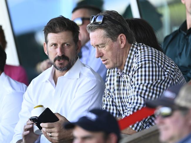 Michael Kasprowicz and Glenn McGrath look on during the public memorial service for Andrew Symonds in Townsville in May. Picture: Ian Hitchcock/Getty Images.