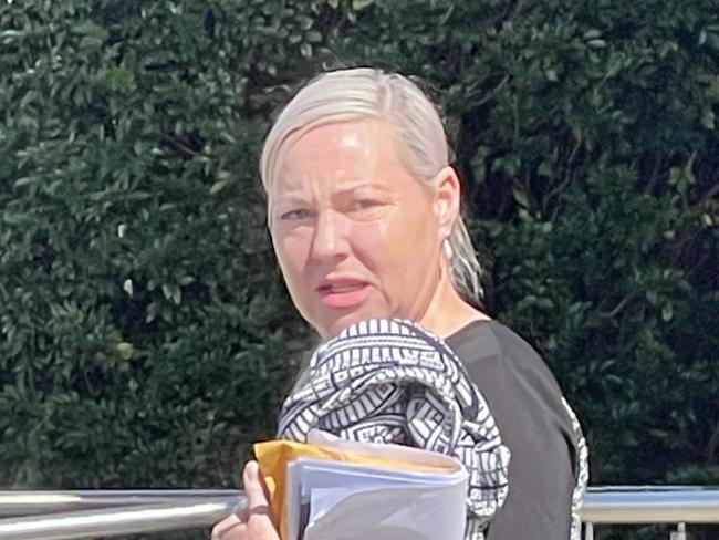 Former police prosecutor Kristy Lea Madden, 46, of Toronto, leaving Belmont Local Court where she is charged with breaching an AVO and being armed with intent to commit an offence. Picture: NewsLocal