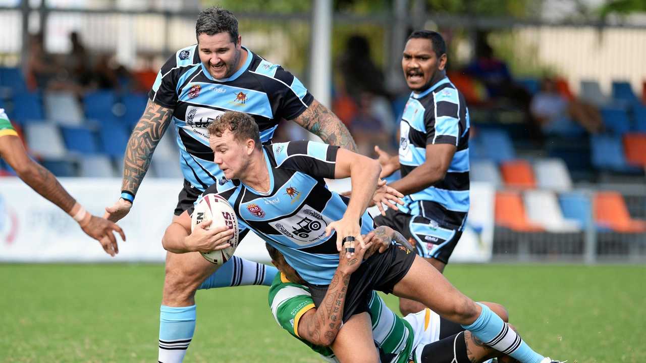 An attacking raid by Norths Chargers Darcy Davey is brought to a halt by some Fitzroy/Gracemere defence. Picture: Allan Reinikka ROK310319aleague2