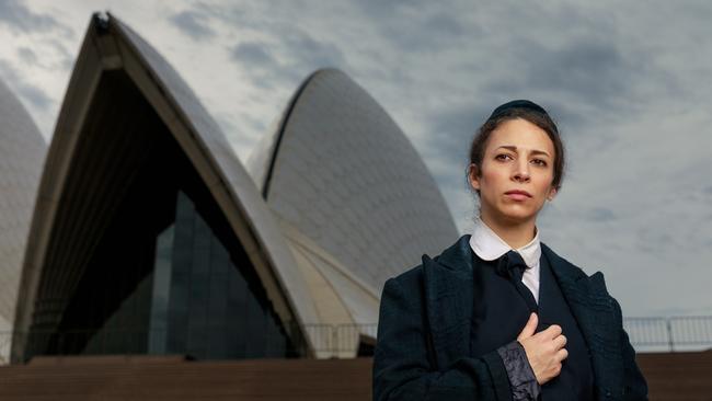 Amy Hack, who plays the lead in a Yiddish production of Yentl, in character on the steps of the Sydney Opera House. Picture: Max Mason-Hubers