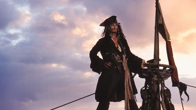 Johnny Depp as Captain Jack Sparrow.