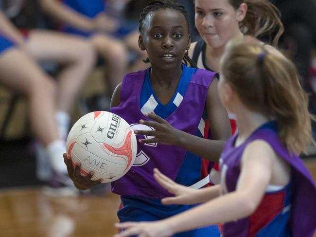 day three of the School Sport SA Sapsasa Netball Carnival.  -  Metro Year 6 Division 2: Adelaide North East v Playford (purple bibs) at Priceline Stadium , 2 June 2021. Picture Simon Cross