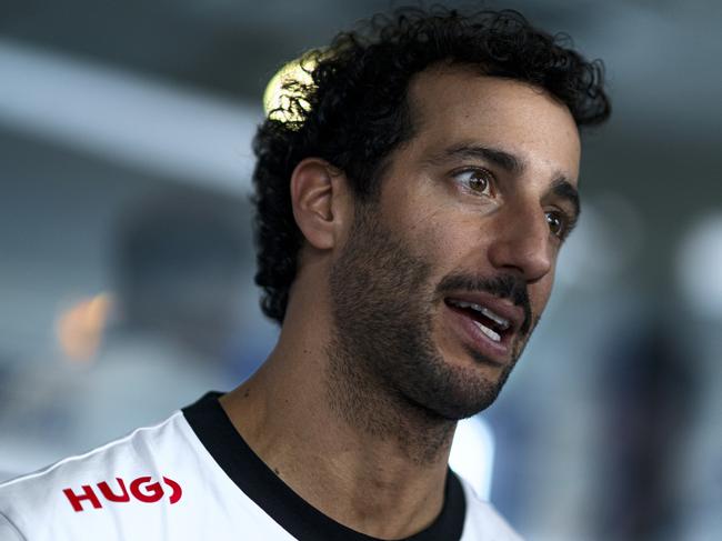 SINGAPORE, SINGAPORE - SEPTEMBER 19: Daniel Ricciardo of Australia and Visa Cash App RB looks on in the Paddock during previews ahead of the F1 Grand Prix of Singapore at Marina Bay Street Circuit on September 19, 2024 in Singapore, Singapore. (Photo by Rudy Carezzevoli/Getty Images)