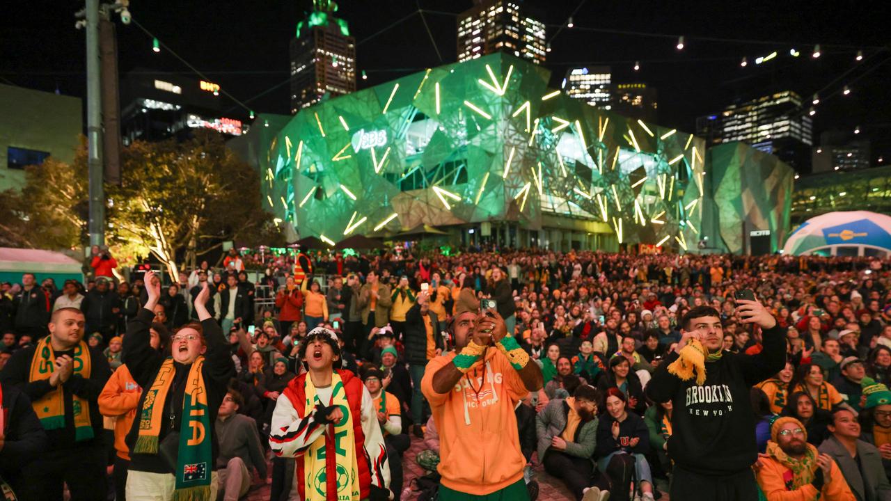 Fans At Melbourne's Federation Square watch the Matildas’ World Cup round of 16 match against Denmark, being played in Sydney. (Photo by Asanka Ratnayake/Getty Images)