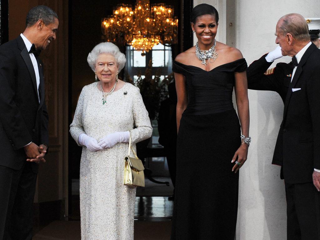 Rubbing shoulders with then-US President Barack Obama and First Lady Michelle Obama in 2011. Picture: Getty