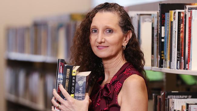 Cairns Regional Council's library services co-ordinator Marina Speziale says the top 10 lists reflect Cairns readers’ desire to relax in a challenging world. Picture: Brendan Radke