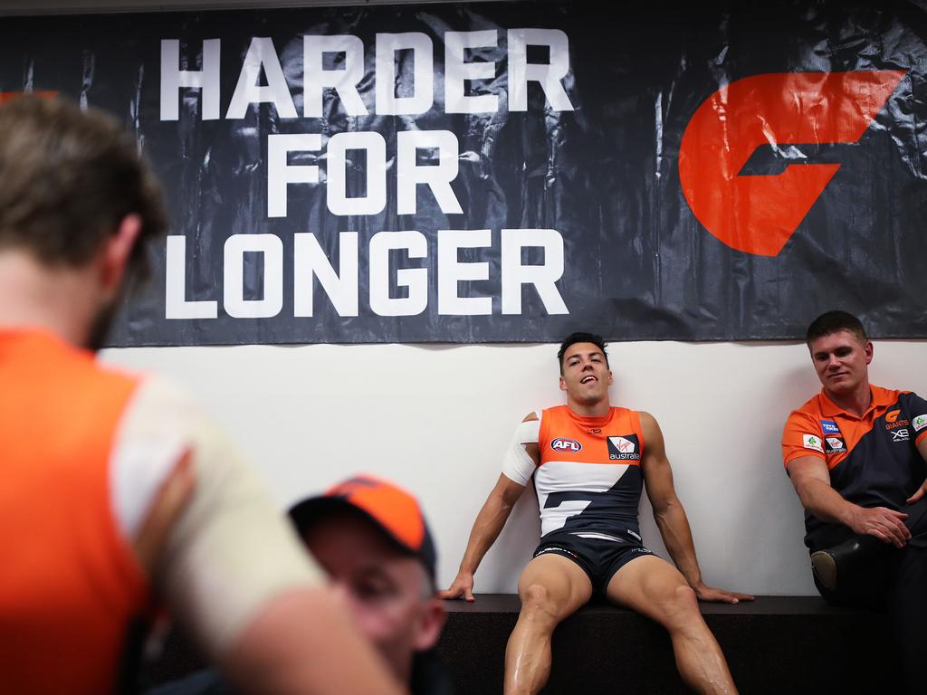 Giants Dylan Shiel sits exhausted after the game following coach Leon Cameron's post match speech. Picture: Phil Hillyard