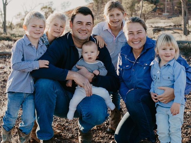 The Bonsey Family pictured in Quilpie, QLD. (L-R) Parents Laura & Jake (holding baby Angus), (children) George, Lucielle, Camille & Frankie. Picture: Lauran Gilligan / The Australian