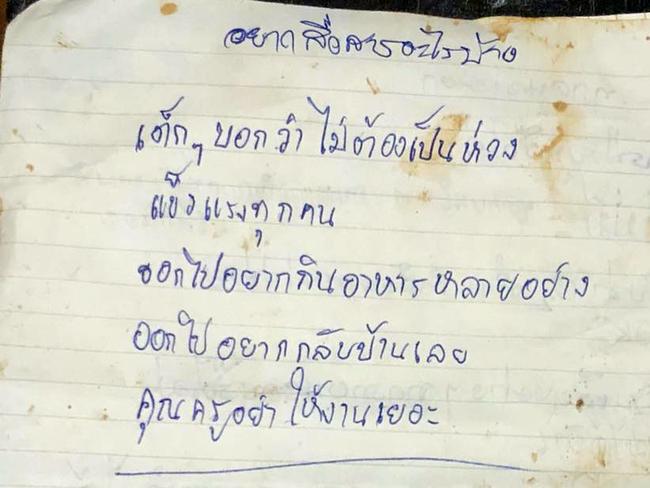 A letter handed to British divers that reads: "the kids say don't be worried about them. All of them are strong. They would like to eat many different kinds of foods when they come out and Teachers, please don't give them too much homework". Picture: Getty