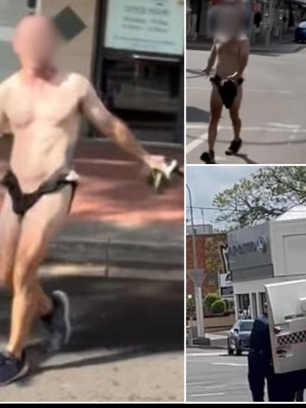 A man walks around the Maryborough CBD in modified shorts resembling underwear on Friday.