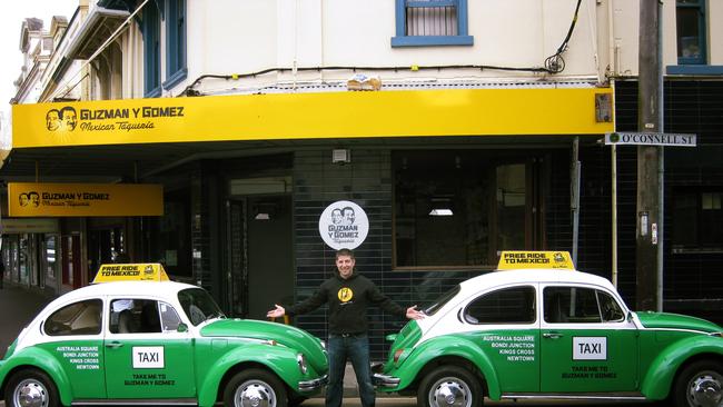 The company used to have a replica Mexican taxi that would take guests to the nearest GYG store. Pictured in the centre is Steven Marks.