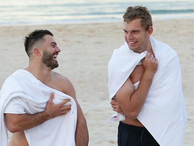 James Tedesco, Tom Trbojevic and Jake Trbojevic of the NSW State of Origin team during a recovery swim at Coogee beach, ahead of Origin game 2. Picture: Brett Costello