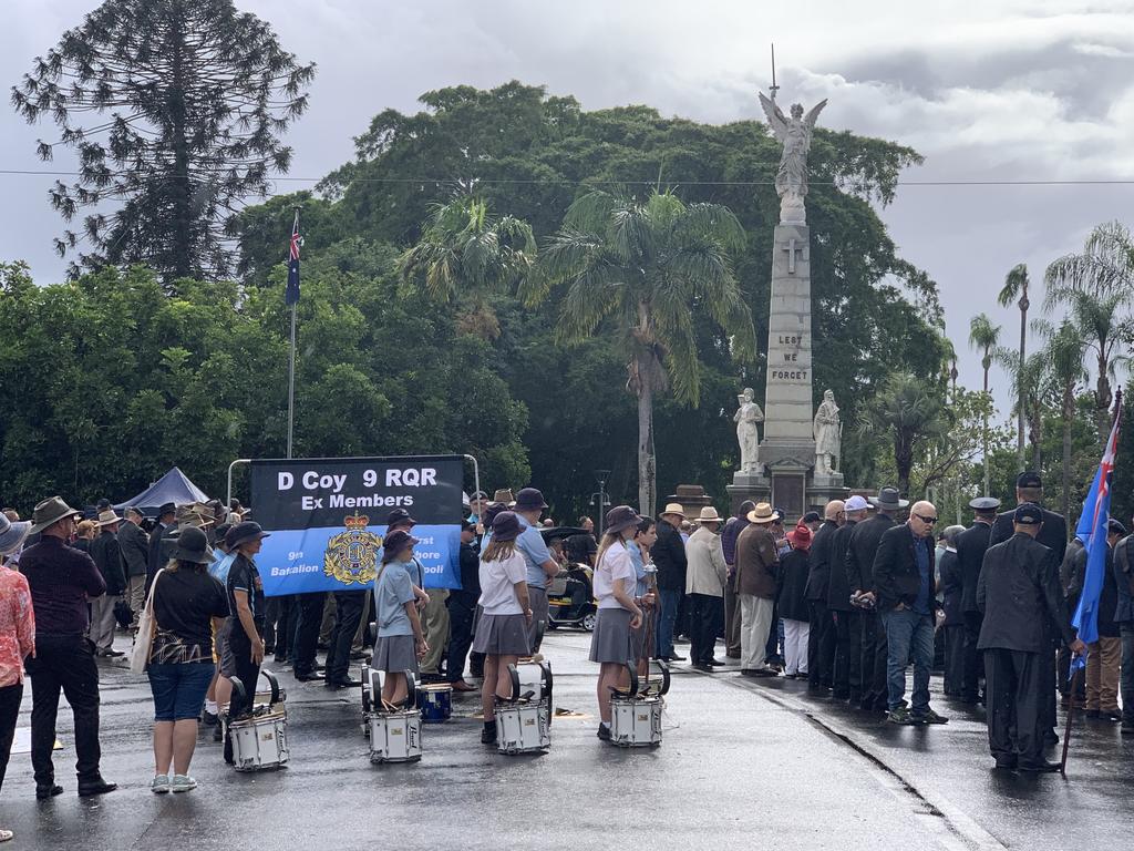 A big crowd assembles at the cenotaph in Maryborough.