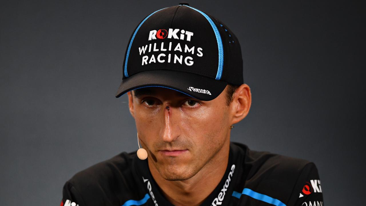 Robert Kubica looks on in the drivers’ press conference ahead of the Singapore Grand Prix.