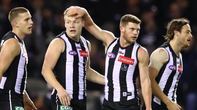 Jordan De Goey celebrates a goal with Taylor Adams. Picture: Scott Barbour/Getty Images