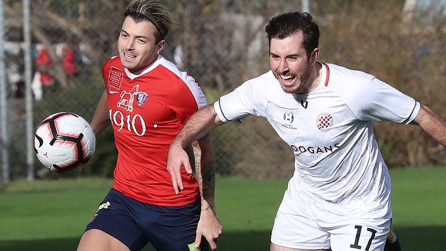 NPL South Hobart vs. Glenorchy Knights, South Hobart Oval: South Hobart's Iskander Van Doorne contests for possession with Glenorchy's Luke Warrener (right). Picture: LUKE BOWDEN