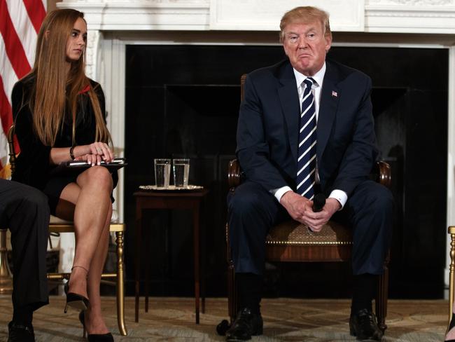 President Donald Trump pauses during a listening session with high school students teachers and others. Picture: AP Photo/Carolyn Kaster