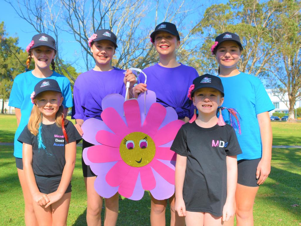 At the 2023 Grand Central Floral Parade are (from left) Jasmine Freeman, Summer Smith, Abbie Logan, Savannah Petlzer, (front from left) Hayley Freeman and Libby Kennard from Mayhem Dance Academy. Picture: Rhylea Millar