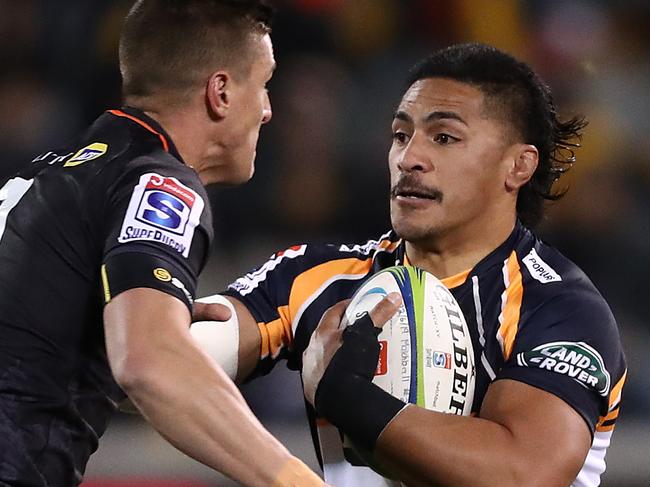 CANBERRA, AUSTRALIA - JUNE 22: Peter Samu of the Brumbies hands off Louis Schreuder of the Sharks during the Super Rugby Quarter Final match between the Brumbies and the Sharks at GIO Stadium on June 22, 2019 in Canberra, Australia. (Photo by Mark Metcalfe/Getty Images)