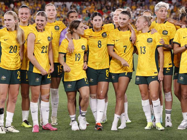 MELBOURNE, AUSTRALIA - FEBRUARY 28: The Matildas celebrate after securing their qualification for the Paris 2024 Olympics after winning the AFC Women's Olympic Football Tournament Paris 2024 Asian Qualifier Round 3 match between Australia Matildas and Uzbekistan at Marvel Stadium on February 28, 2024 in Melbourne, Australia. (Photo by Darrian Traynor/Getty Images)