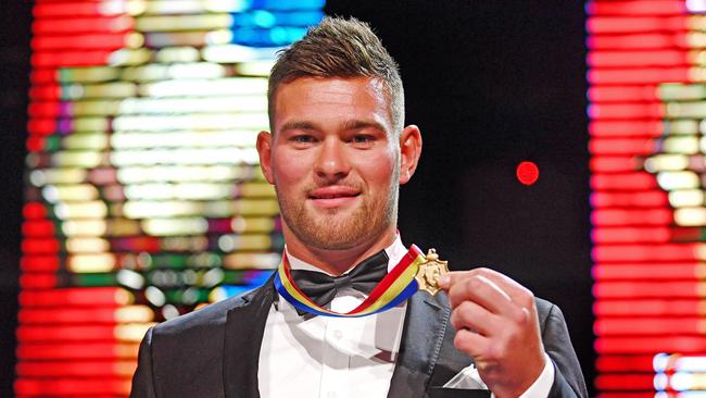 Norwood star Mitch Grigg with his second SANFL Magarey Medal at Adelaide Oval. Picture: Tom Huntley