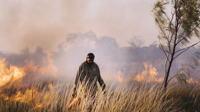 Ranger Jason Adams at work. Wunambal Gaambera rangers in the north Kimberley have brought wildfires down from almost 25 per cent of country engulfed in hot late season fires to a mere 7 per cent in less than eight years. Picture: Supplied