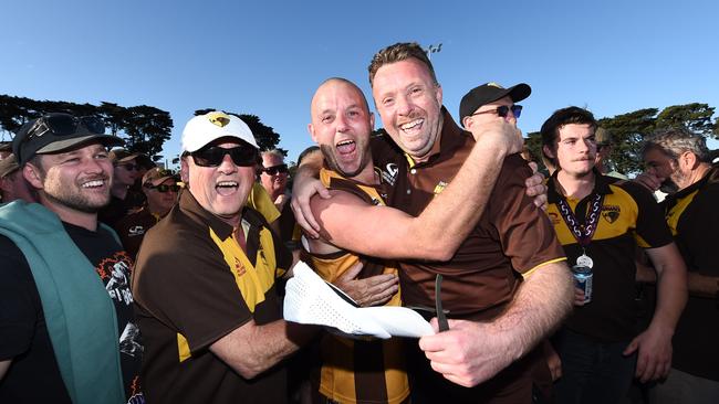 Adam Donohue and Chris Moore celebrate the win post-match.