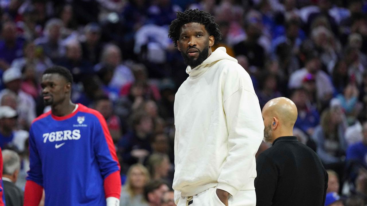 PHILADELPHIA, PENNSYLVANIA - OCTOBER 23: Joel Embiid #21 of the Philadelphia 76ers looks on during a timeout against the Milwaukee Bucks in the first half at the Wells Fargo Center on October 23, 2024 in Philadelphia, Pennsylvania. NOTE TO USER: User expressly acknowledges and agrees that, by downloading and/or using this photograph, user is consenting to the terms and conditions of the Getty Images License Agreement. Mitchell Leff/Getty Images/AFP (Photo by Mitchell Leff / GETTY IMAGES NORTH AMERICA / Getty Images via AFP)