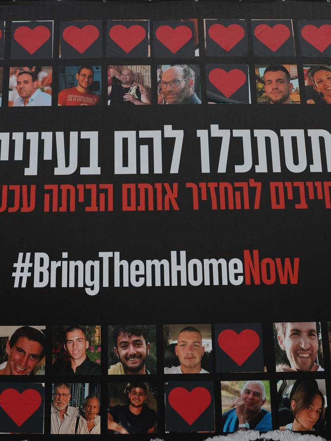 A poster bearing pictures of Israeli hostages held by the Hamas movement. Picture: AFP.