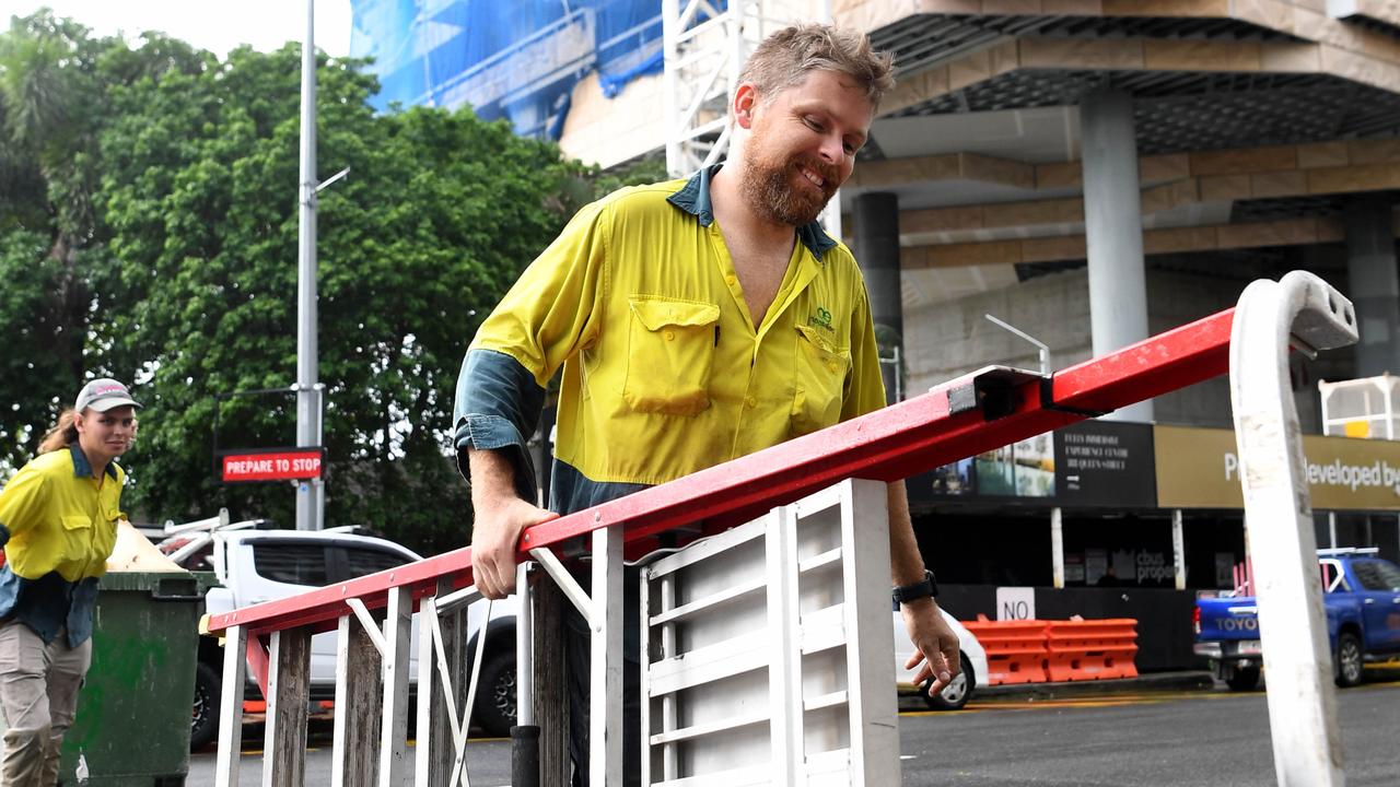 Sub-contractors and tradesmen pack up their equipment and walk off the 443 Queens Street construction site in Brisbane. Picture: Dan Peled/NCA NewsWire