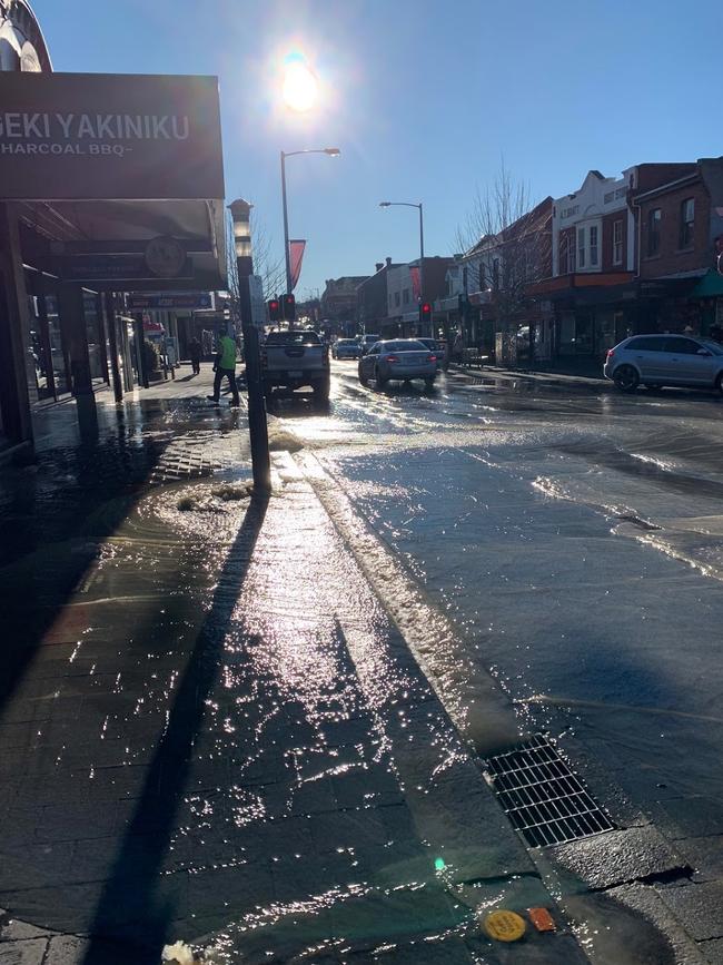 The popular North Hobart restaurant strip has been flooded on Friday July 9, 2021. Picture: SUPPLIED.