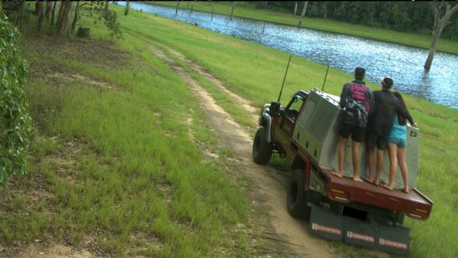 Passengers illegally riding on the back of a ute at Danbulla State Forest. Dozens of vehicle owners who illegally entered the national park and allegedly caused damage have been caught by Queensland Parks and Wildlife Service. Picture: QPWS