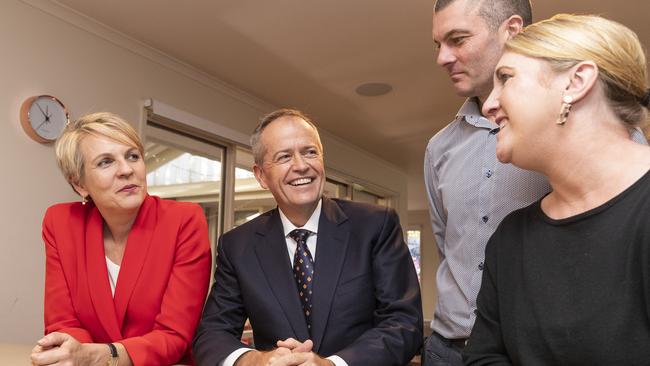 Tanya Plibersek and Bill Shorten with Jacqui and Richard Davis at their home in Mitcham, Melbourne, yesterday. Picture: AAP. 